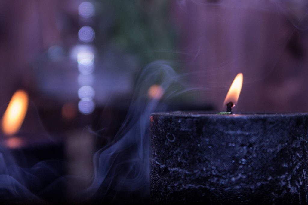 Faelorin | Beautiful dark candle Faelorin Store | Beautiful dark candle with a flickering flame and soft whisps of smoke